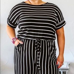 NWOT Boutique Romper. Pics show boutique model.